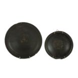 TWO CERAMIC DISHES, 20TH CENTURY black varnished. Measures cm. 6 x 22 and cm. 17,5.   DUE