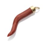 PENDANT horn-shaped in red coral, with mount in yellow gold 18 kts. Length cm. 8,5, total weight gr.