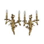 PAIR OF APPLIQUES IN ORMOLU, 20TH CENTURY of Louis 15th taste, of two ramage arms. Measures cm. 37 x