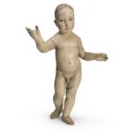 CHILD'S SCULPTURE IN LACQUERED WOOD, NAPLES 19TH CENTURY in polychromy, with glass eyes. Measures