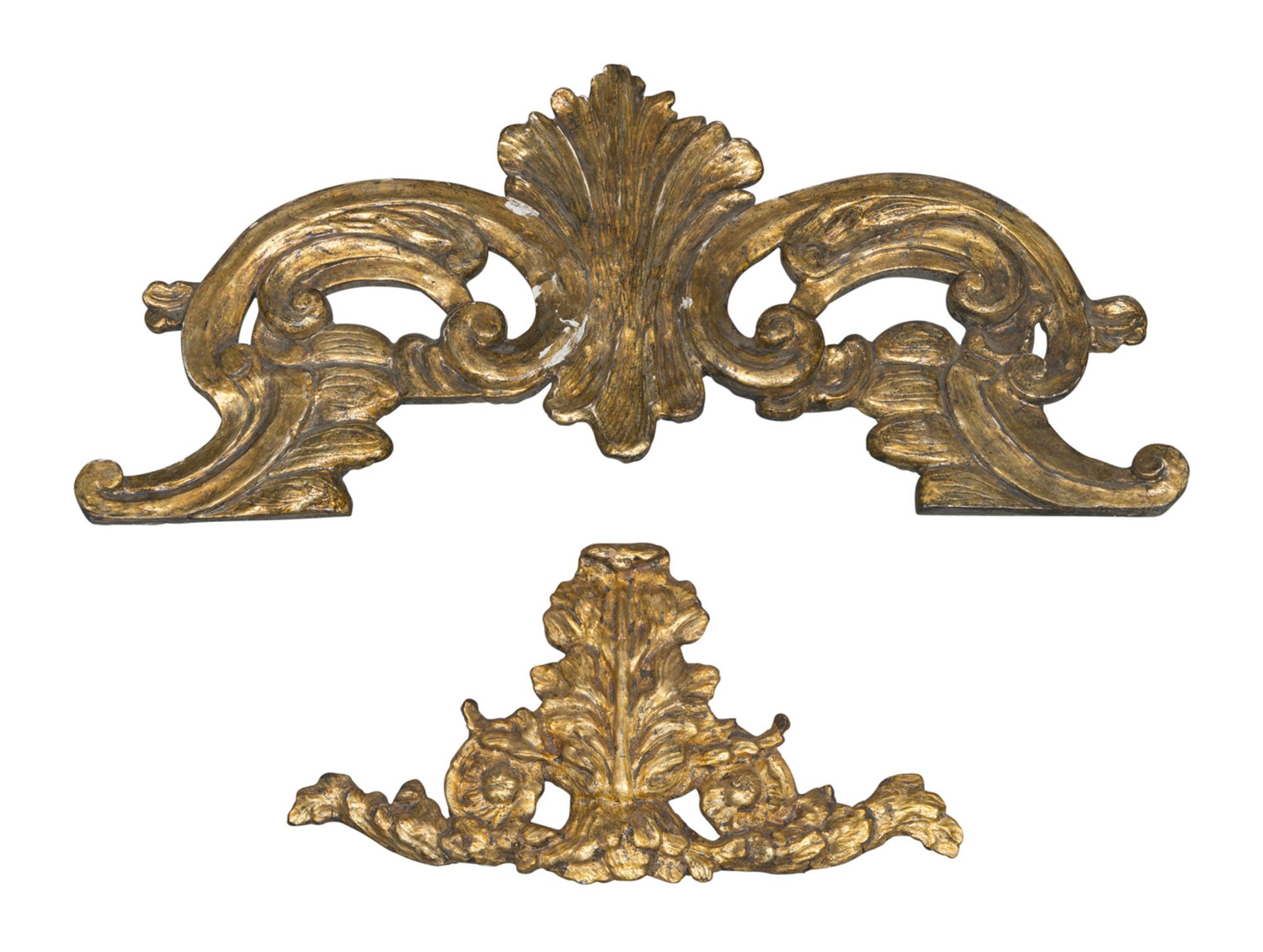 TWO SMALL FRIEZES IN GILTWOOD, ANTIQUE ELEMENTS carved to roccailles and curls. Measures cm. 49 x