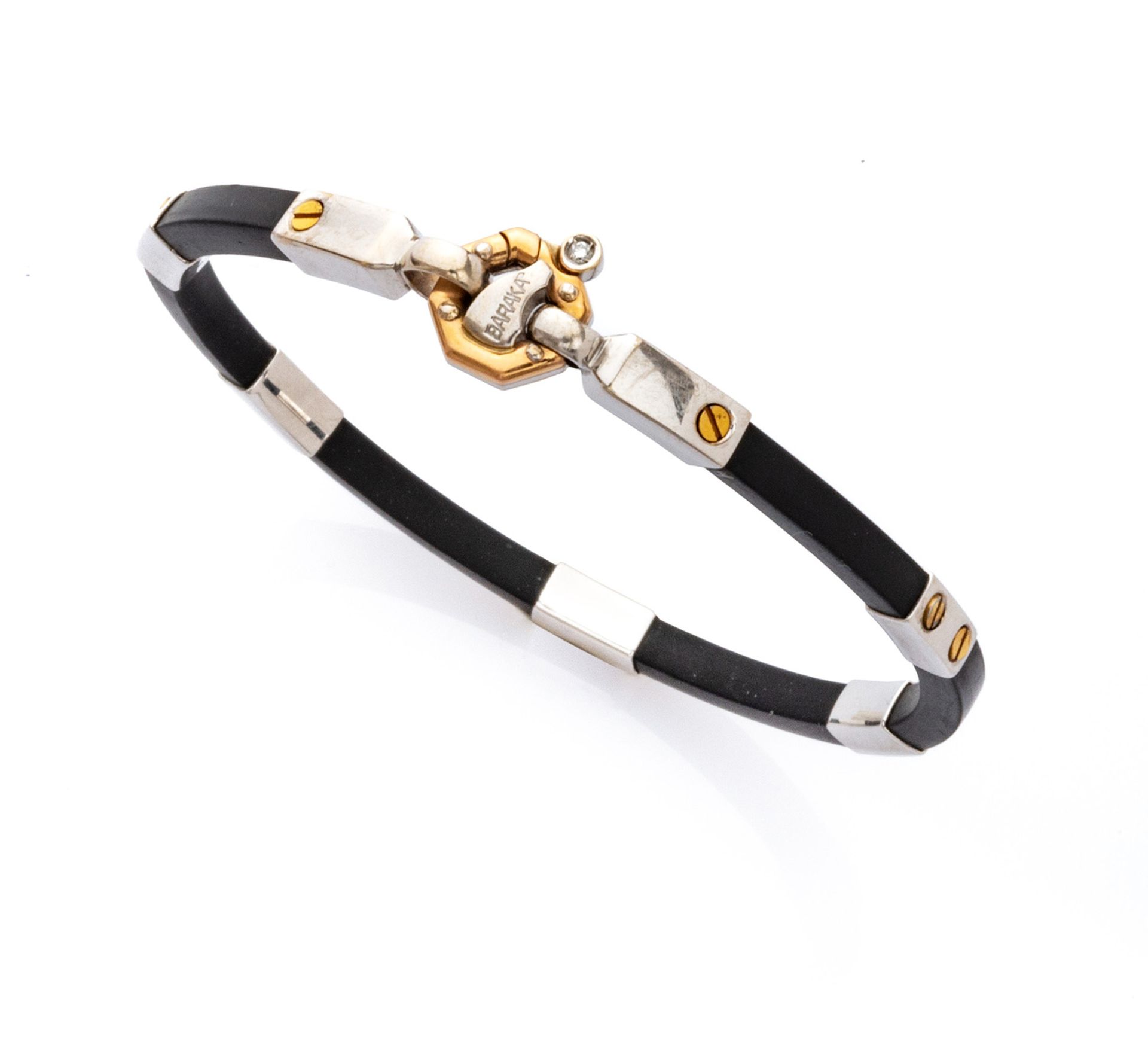 SEMIRIGID BARAKA BRACELET in caucciù alternated by plaquettes with engraved brand. Length cm. 21,