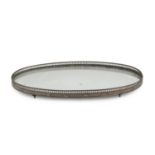 TRAY WITH MIRROR, EARLY 20TH CENTURY edge with railing in silver-plated metal. Wooden ground.