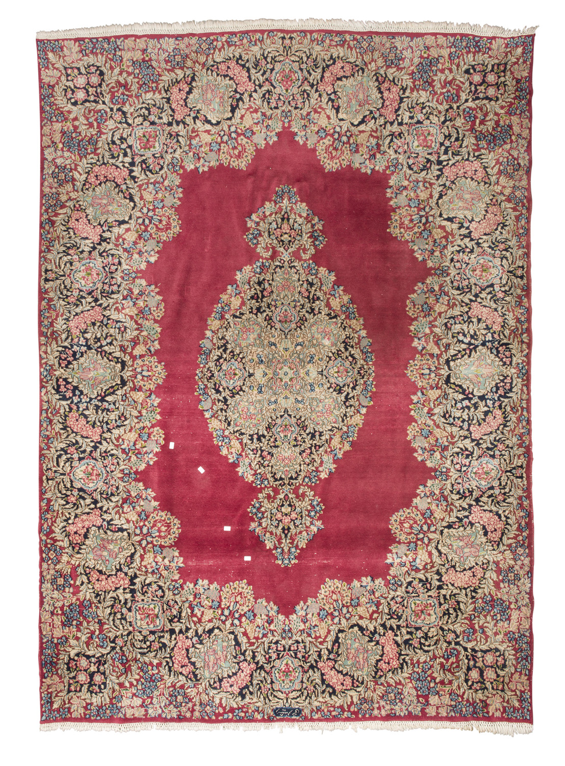 BEAUTIFUL KIRMAN CARPET, EARLY 20TH CENTURY medallion with flower branches and garlands in a red