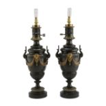 A PAIR OF TABLE LAMPS IN BRONZE, PROBABLY FRANCE NAPOLEONE III with applications of draperies and