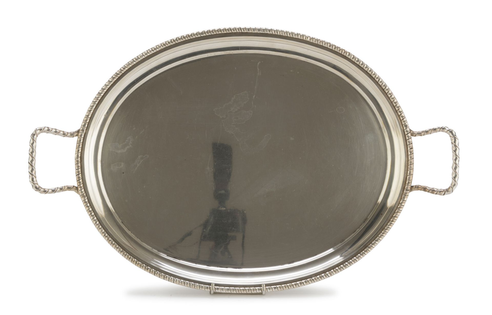 SILVER TRAY, GERMANY LATE 19TH CENTURY with ribbon edge and handles. Measures cm. 33 x 52, weight