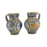 A PAIR OF MAIOLICA JUGS, GRAZIA DERUTA EARLY 20TH CENTURY decorated with coat of arms with