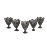 FIVE EGG CUPS IN FILIGREE, LATE 19TH CENTURY decorated with spirals and scrolls. Measures cm. 6 x 5.