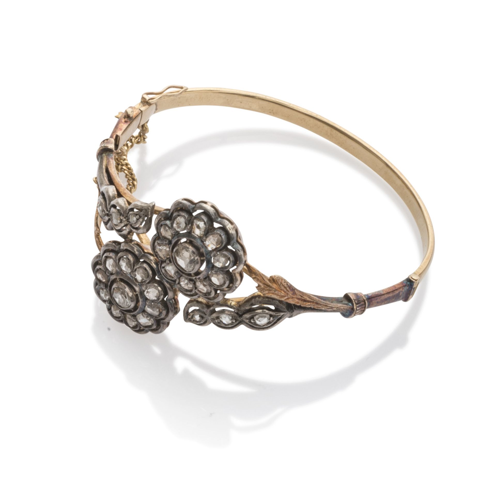 SLENDIDO BRACCIALE in gold and silver, decorated with flowers and leaves embellished with rose cut