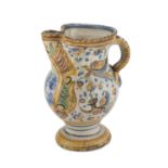 WATER JUG IN MAIOLICA, URBINO AREA 19TH CENTURY polychrome enameled, front decorated with