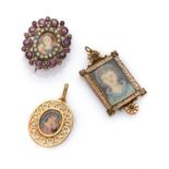 THREE PENDANTS with mounts in yellow gold 18 kts. and silver '800, adorned by micro pearls and