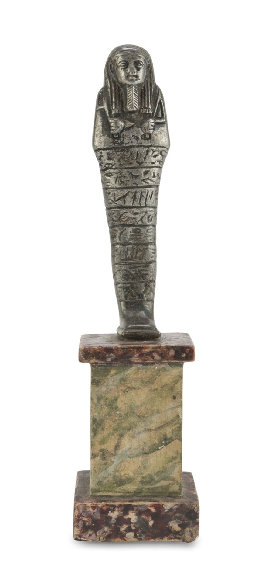 USHABTI IN PEWTER, EGYPTIAN STYLE 20TH CENTURY engraved with pictographic motifs. Wood base