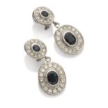 SPLENDID EARRINGS in white gold 18 kts., with pendants of oval shape with central sapphires edged by