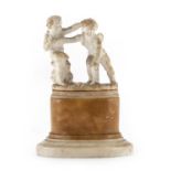 SMALL GROUP IN FOAM, MID-19TH CENTURY representing playing cupids. Oval base in marbles. Measures