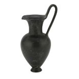 BUCCHERO JUG, 6th CENTURY B.C. in black polished. Entire. H. cm. 20. The find is reported to the