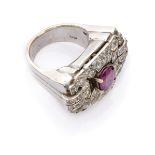 SPLENDID RING in white gold 18 kts., of geometric design with central ruby embellished with