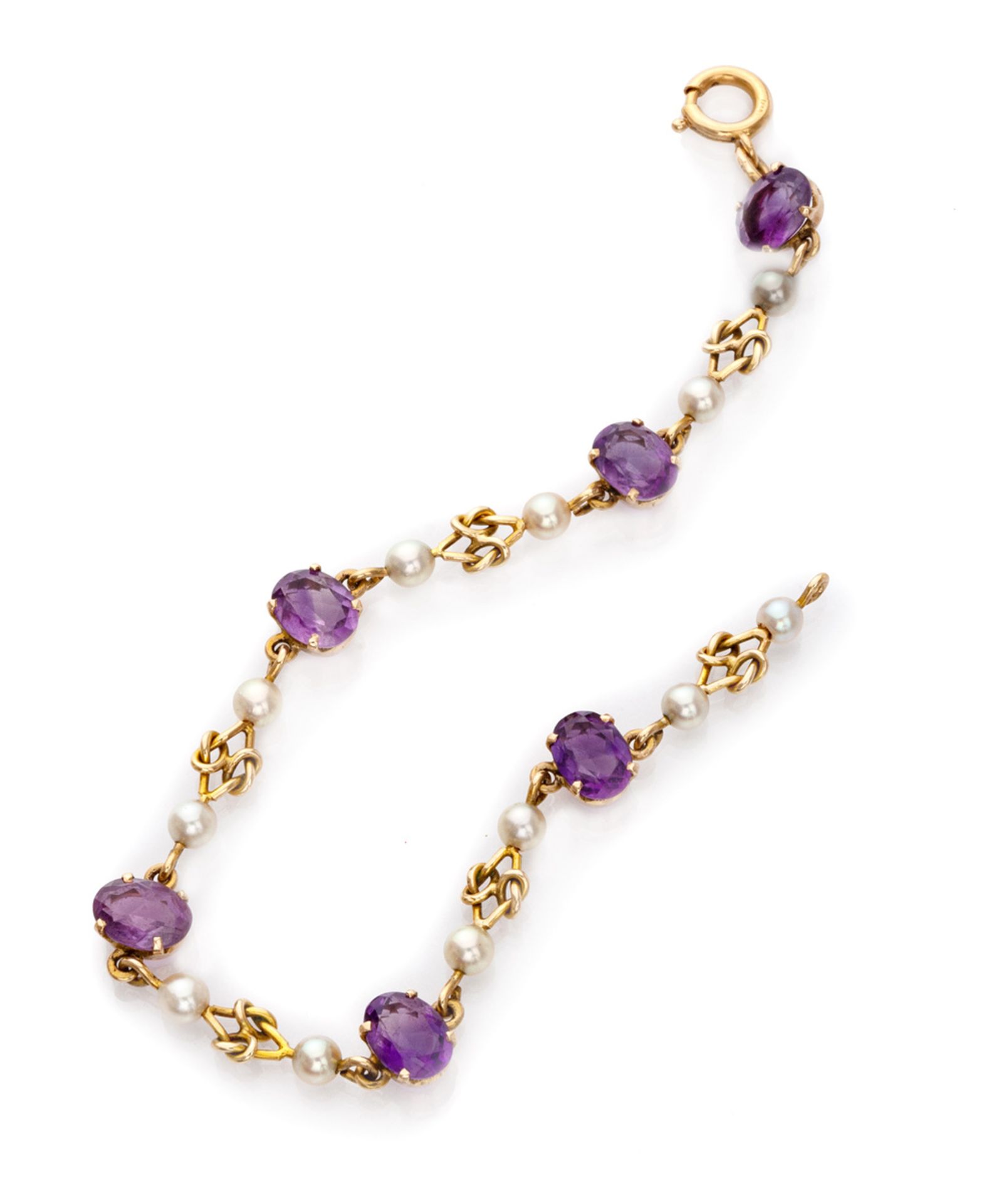 FANTASY BRACELET in yellow gold 18 kts., with amethysts and small pearls. Length cm. 19, total