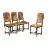 FOUR CHAIRS IN WOOD DYED TO CHERRY TREE EARLY 20TH CENTURY tall crenellated back, conic legs with