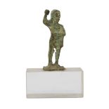 BRONZE SCULPTURE, 20TH CENTURY of archaic style, with green patina, representing figure in pose with