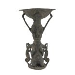 LAMP IN BRONZE, AFRICA 20TH CENTURY body of anthropomorphous shape and superior end as cup. Measures