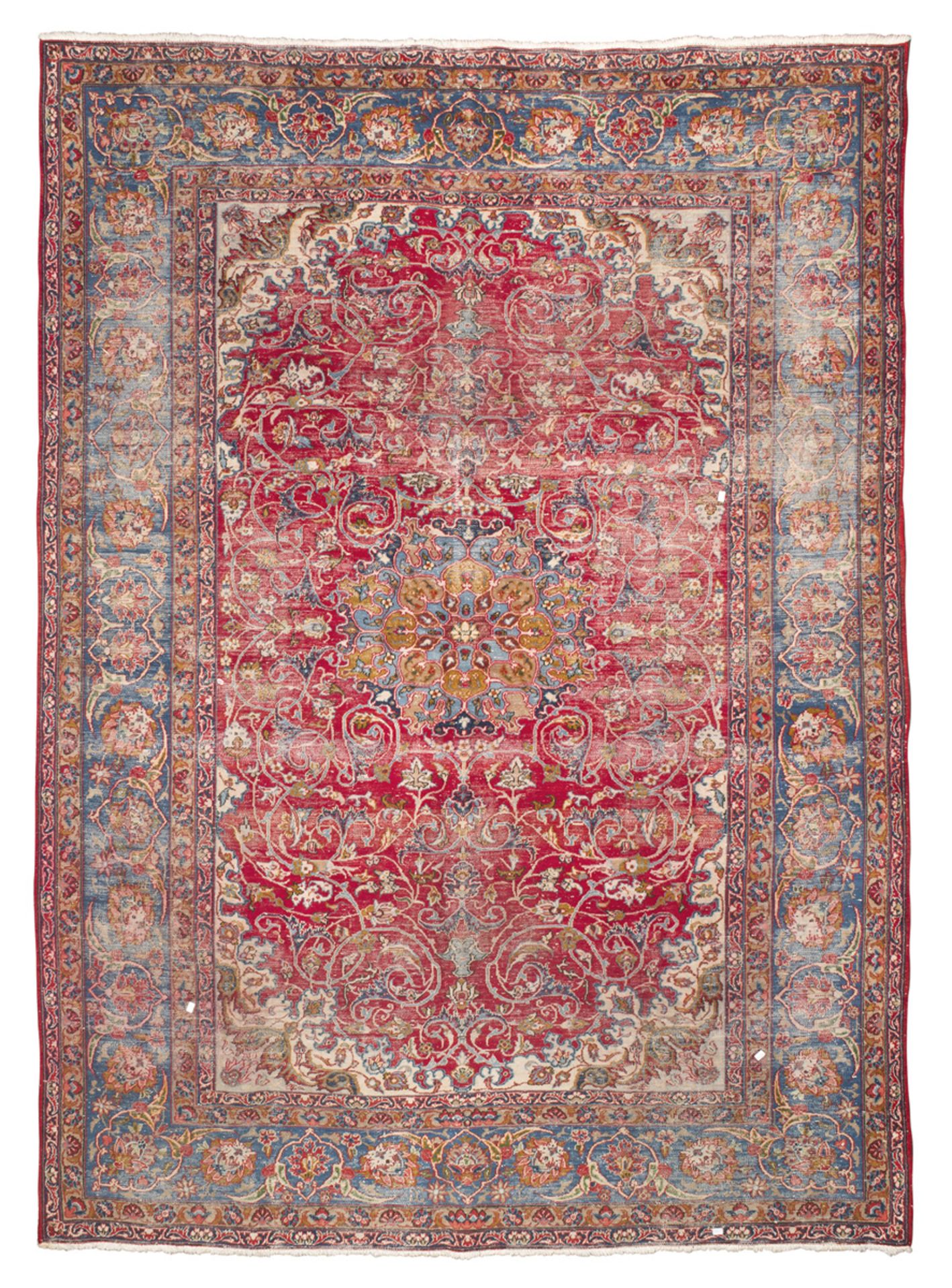 ISFAHAN CARPET, EARLY 20TH CENTURY with blue medallion and secondary motifs of twisted branches with