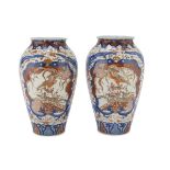 A PAIR OF PORCELAIN VASES, JAPAN, LATE 19TH CENTURY decorated with phoenixes and floral