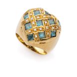 RING in yellow gold 18 kts., with heart-shaped aquamarine and braided bands embellished with