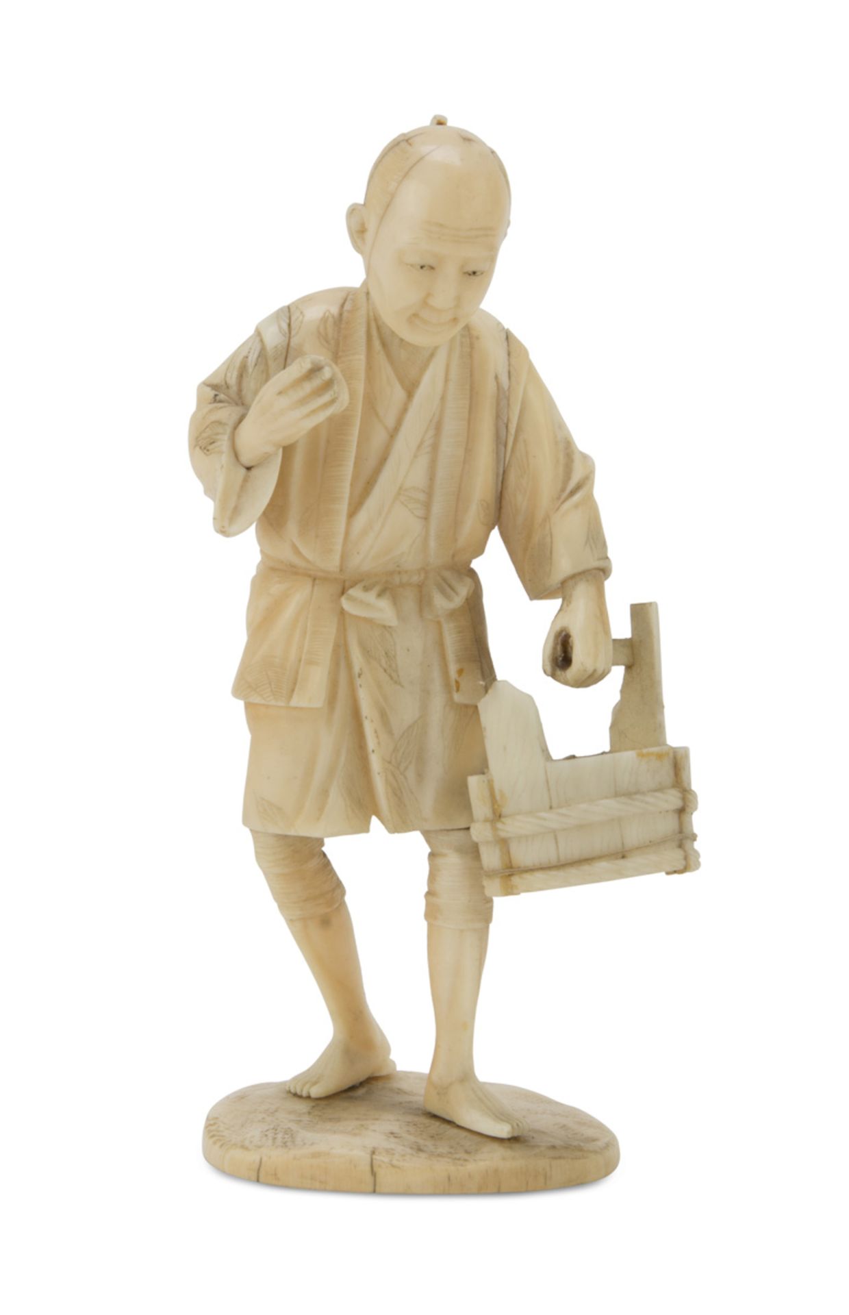 SCULPTURE IN IVORY, JAPAN LATE 19TH CENTURY representing a farmer with basket. Measures cm. 13 x 7 x