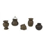 FIVE SMALL BRONZE CONTAINERS, INDIA FIRST HALF 20TH CENTURY decorated with engravings of vegetal