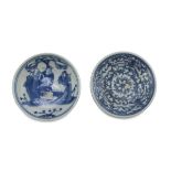 TWO SAUCERS IN WHITE AND BLUE PORCELAIN, CHINA 19TH - 20TH CENTURY decorated with vegetal