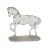 SMALL SCULPTURE IN CRYSTAL GLASS, SWAROWSKY 20TH CENTURY representing a horse. Tail in opalines.