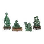 FOUR SCULPTURES IN MALACHITE, CHINA 20TH CENTURY representing He Xiangu, Lao Shouxing and Yang