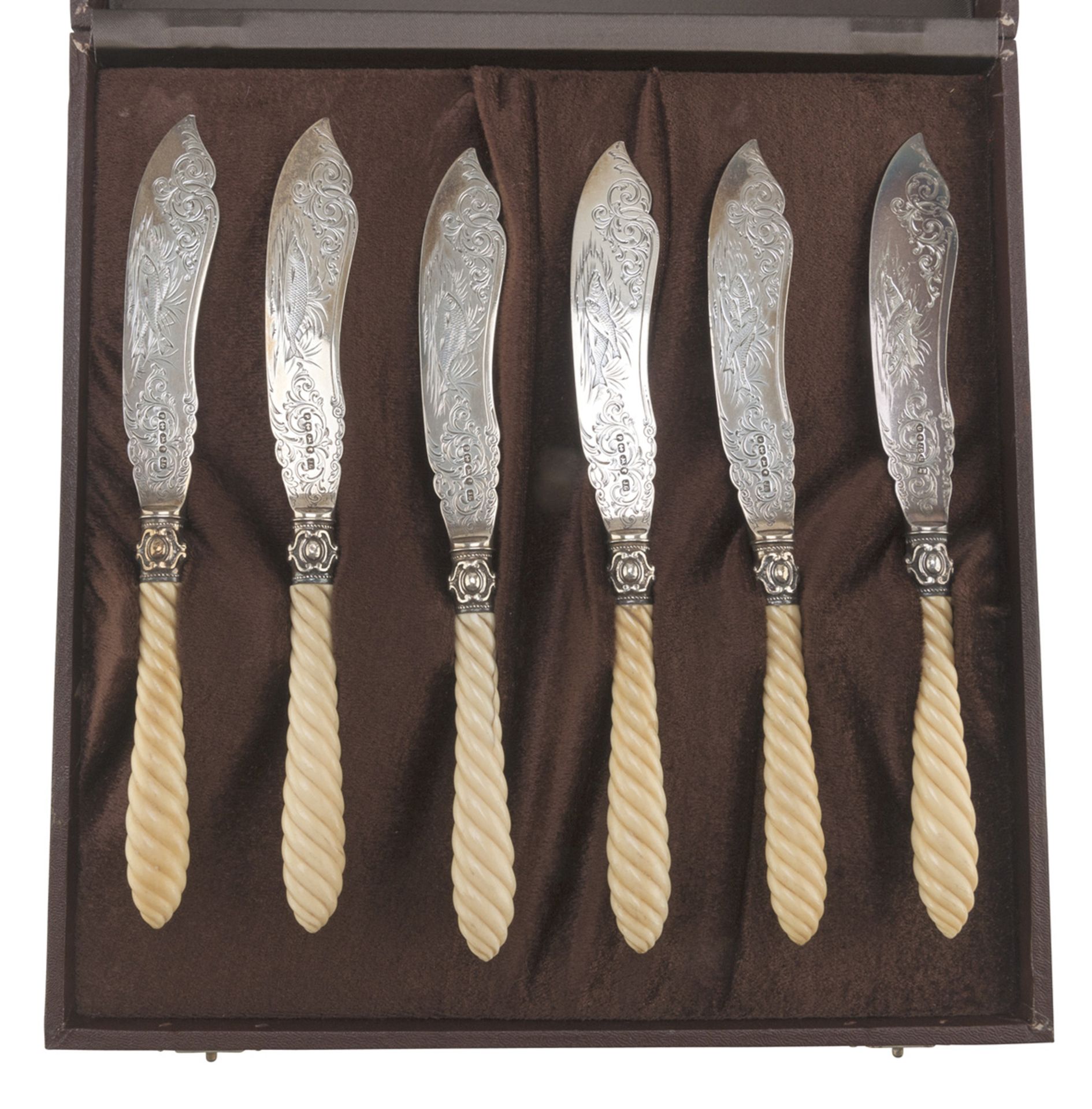 SIX FISH KNIVES IN SILVER, PUNCH BIRMINGHAM 1864 with bone handles and blades chiseled to figures of