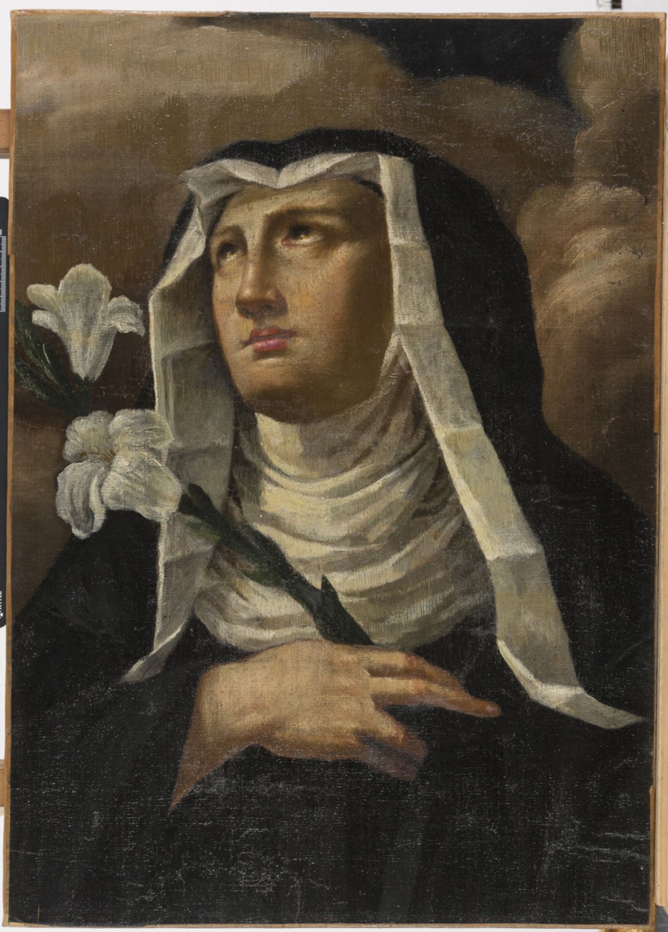 CENTRAL ITALIAN PAINTER, 17TH CENTURY Saint Chiara Oil on canvas, cm. 61 x 43,5 Conditions of the