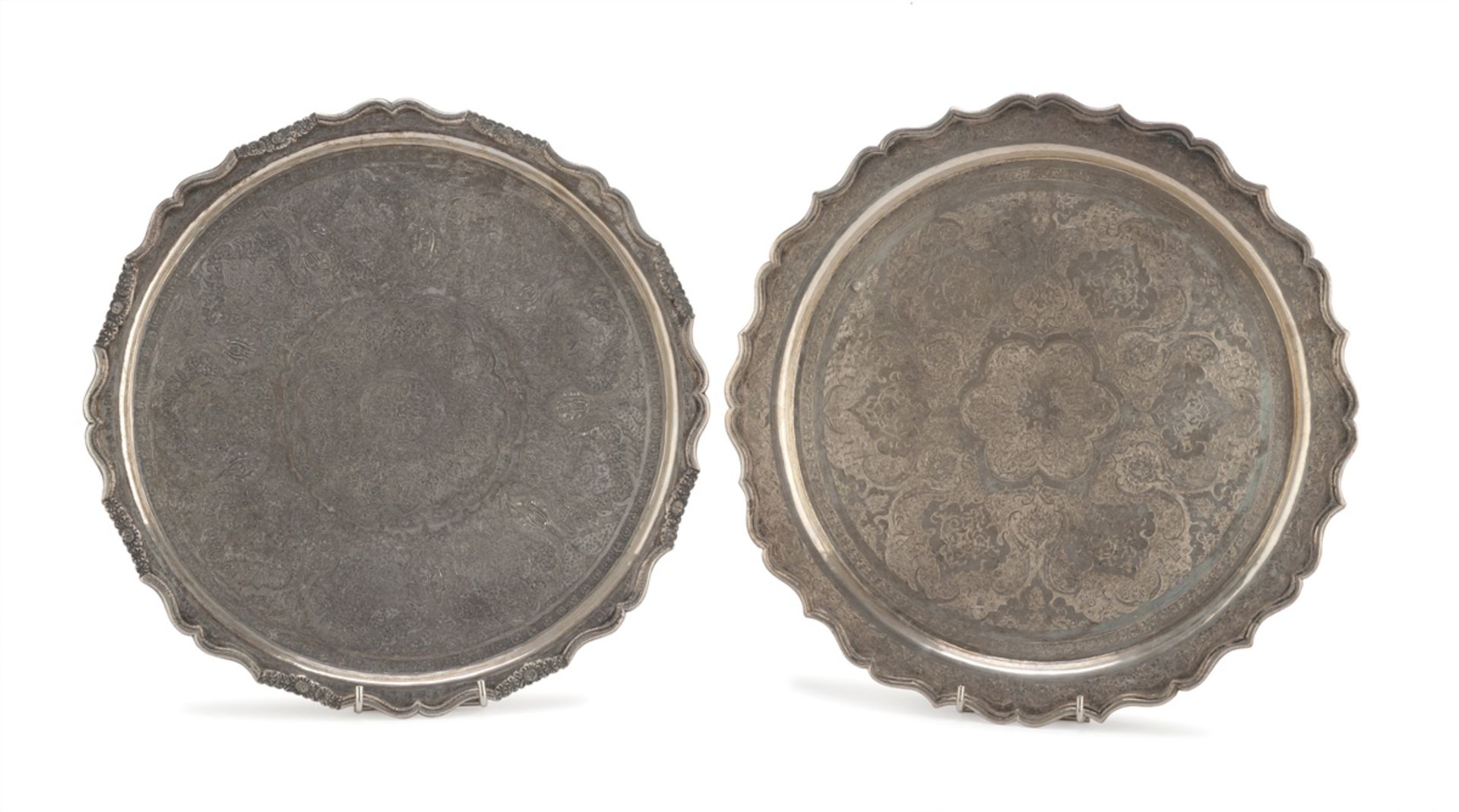 TWO SILVER TRAYS, PERSIA 19TH CENTURY engraved with Carthusian decorations, borders with scrolls and