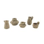 FIVE MINIATURE VASES, 5TH-4TH CENTURY B.C. in clay. Entire. h. cm. 3-6 The find is reported to the