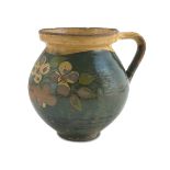 CERAMIC PITCHER, 19TH CENTURY in yellow and green enamel decorated with flowers. Measures cm. 16 x