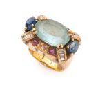 ANTIQUE RING in yellow gold 18 kts., dome-shaped with central aquamarine and contour of sapphires,