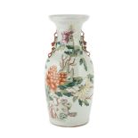 PORCELAIN VASE IN POLYCHROME ENAMELS, CHINA 20TH CENTURY decorated with fantasies of peonies and