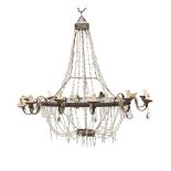 BELL CHANDELIER, EMPIRE PERIOD with elements in gilded metal and wrought iron. Twelve leafy arms