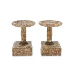 A Pair of Red Verona Marble Stands, EARLY 20TH CENTURY with round dish and finishes in gilded metal.