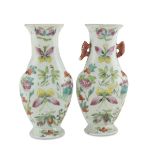 A PAIR OF WALL FLOWER STANDS IN PORCELAIN, CHINA EARLY 20TH CENTURY decorated with butterflies,