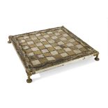 BRONZE CHESSBOARD, 20TH CENTURY edges chiseled to vegetal motifs. Measures cm. 7 x 60 x 60. Defects.