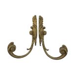 A PAIR OF ORMOLU CURTAIN RODS, LATE 18TH CENTURY with leafy arm. Measures cm. 23 x 7 x 16. COPPIA DI