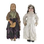 TWO DOLLS, EARLY 20TH CENTURY in wood and ceramics. Dresses in fabric and satin. Measures cm. 46 x