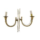 A PAIR OF APPLIQUES IN ORMOLU, EARLY 19TH CENTURY with vegetal chisels and cornucopia arms. Measures