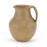 EARTHENWARE JUG, 3rd CENTURY B.C. in bright beige clay and opaque black varnish. h. cm.14. The