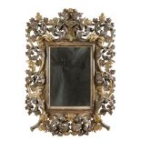 MIRROR IN GILDED AND SILVER-PLATED WOOD, BAROQUE STYLE, EARLY 20TH CENTURY carved to big twisted