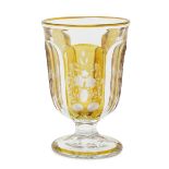 CRYSTAL GLASS, VIENNA EARLY 20TH CENTURY yellow ground, cut and engraved with vegetal motifs.