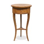 SMALL TABLE IN CHERRY TREE, FIRST HALF OF THE 19TH CENTURY with round tabouret top with one